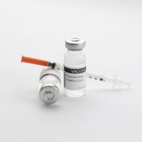 COVID Vaccine vial and syringe